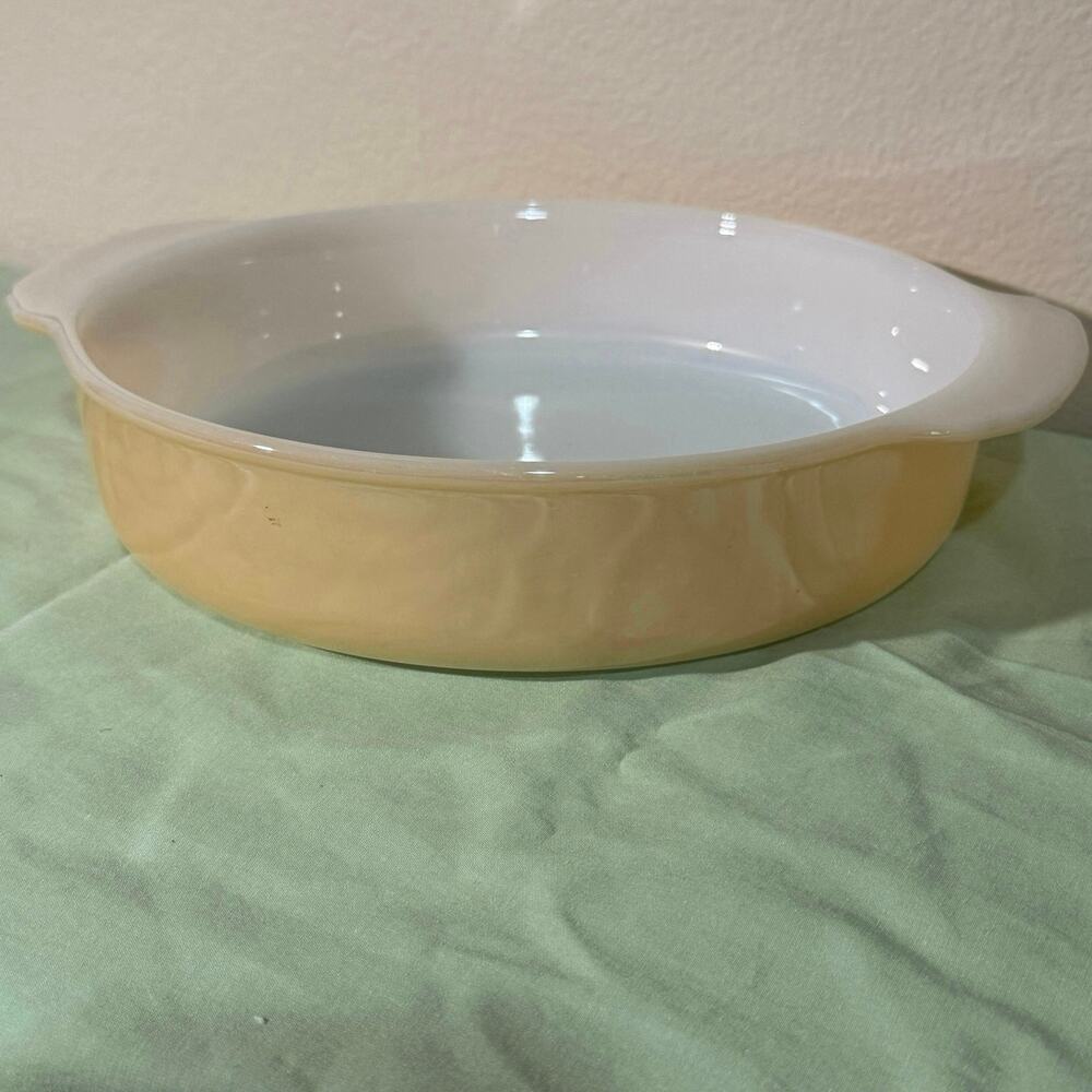 Fire King 8” Peach Luster casserole baking dish. Vintage mid-century